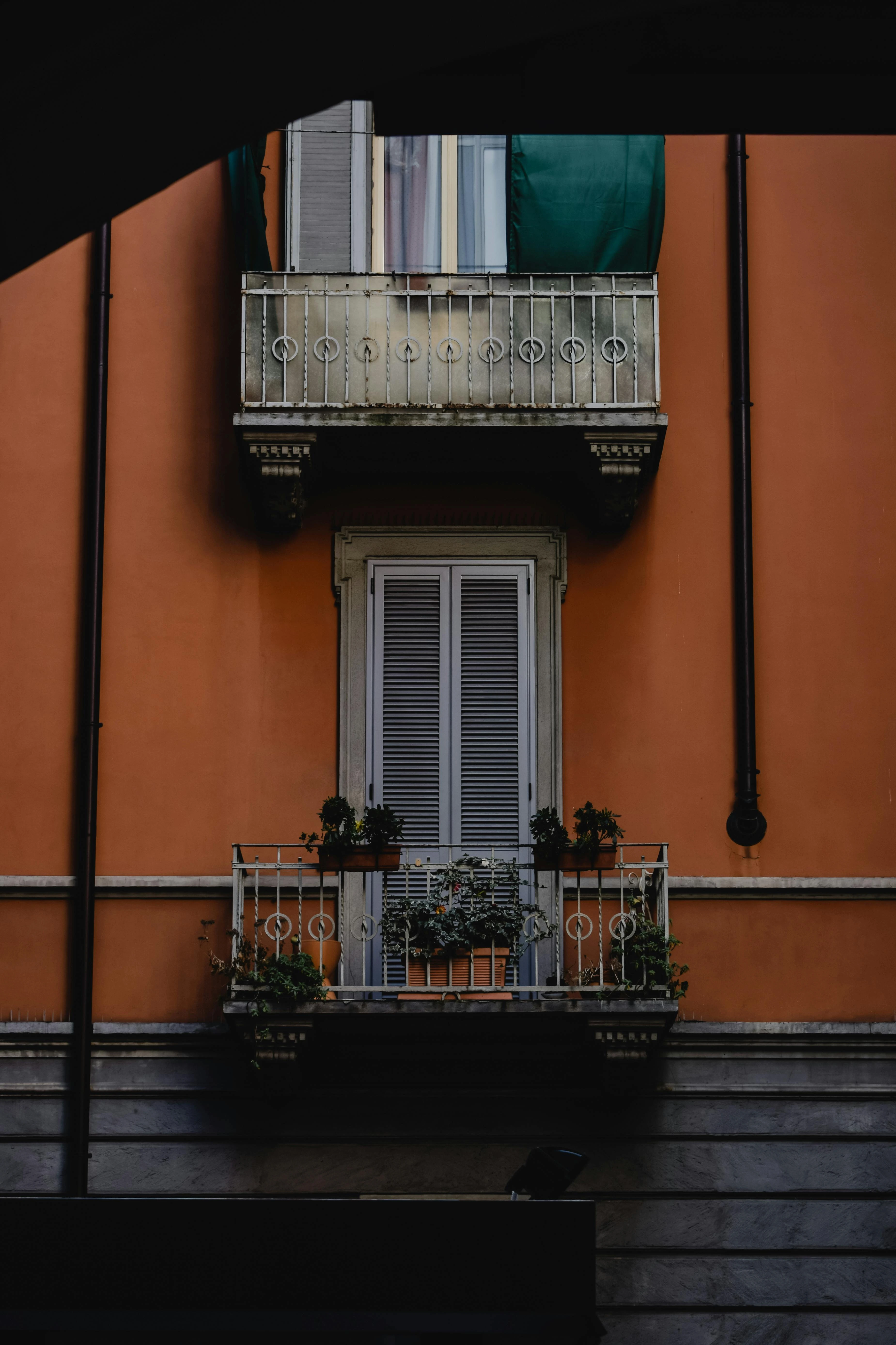 Stylish balcony featuring black wrought iron design