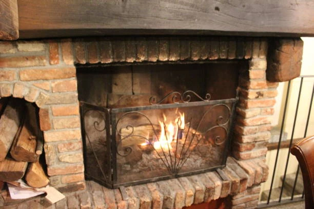 Large iron fireplace with traditional design 