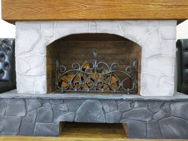 Iron fireplace with open hearth and sturdy frame 