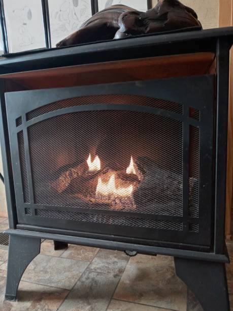 Contemporary iron fireplace with sleek lines 