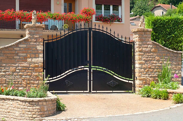 Artistic wrought iron gate with floral motifs 