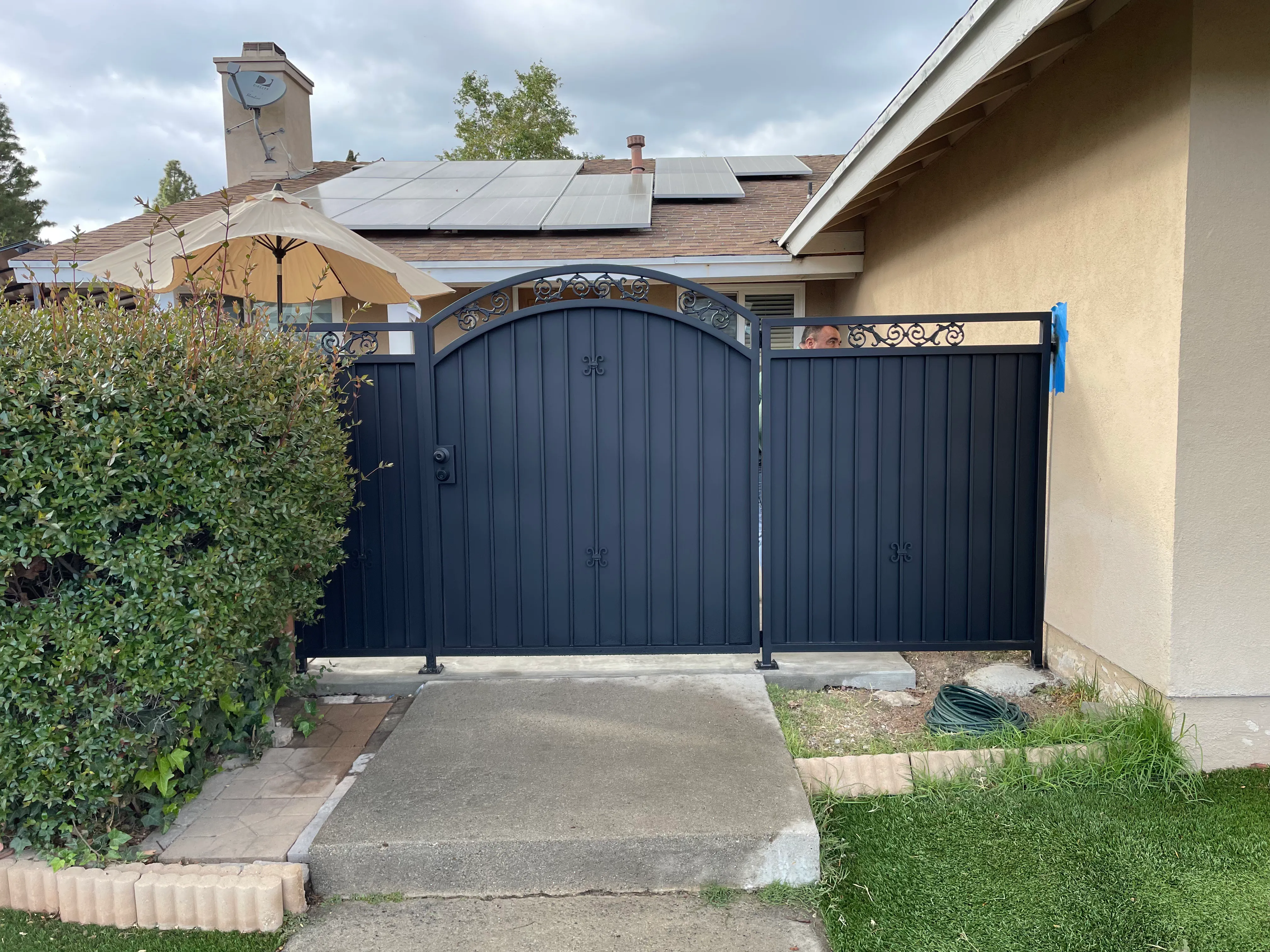 Vintage iron gate with scrollwork details 